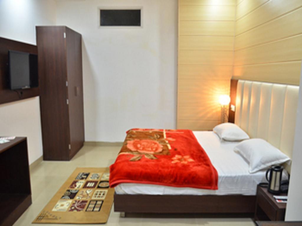 Hotel Popular Αμριτσάρ Δωμάτιο φωτογραφία